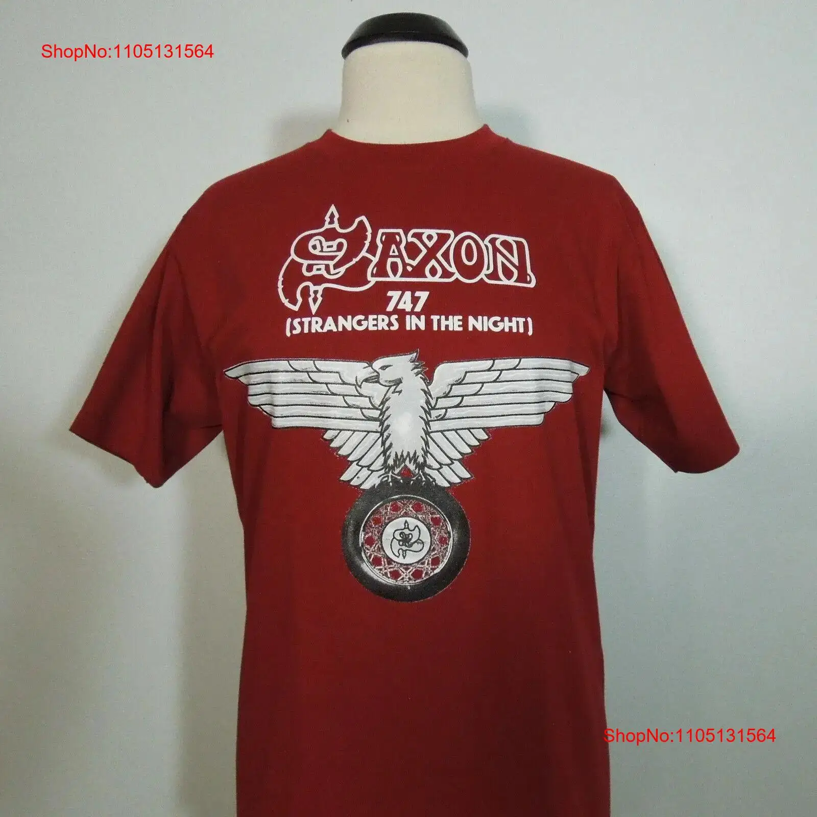 SAXON 747 Strangers In The Nig - огляд і ціна Vintage Fashion Logos